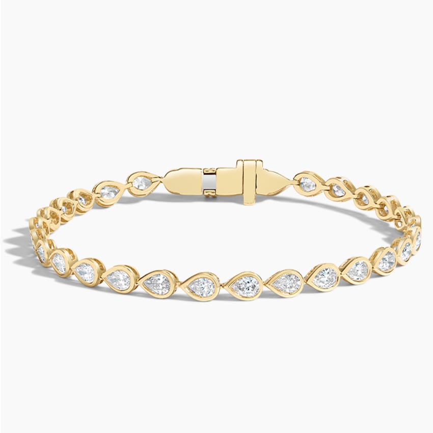Elegant Pear Gold Tennis Bracelet with Emerald-Cut Stones