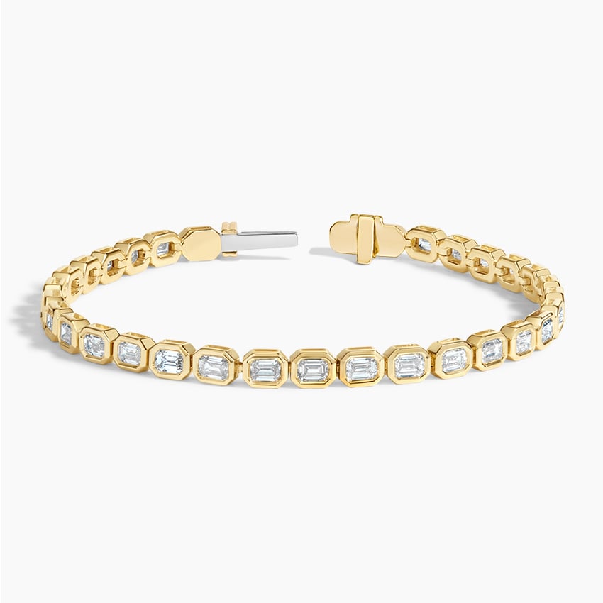 Elegant Emerald Gold Tennis Bracelet with Emerald-Cut Stones