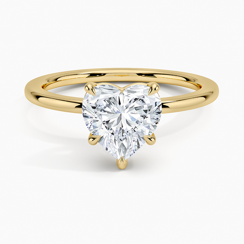 Romantic heart diamond engagement ring in yellow gold band