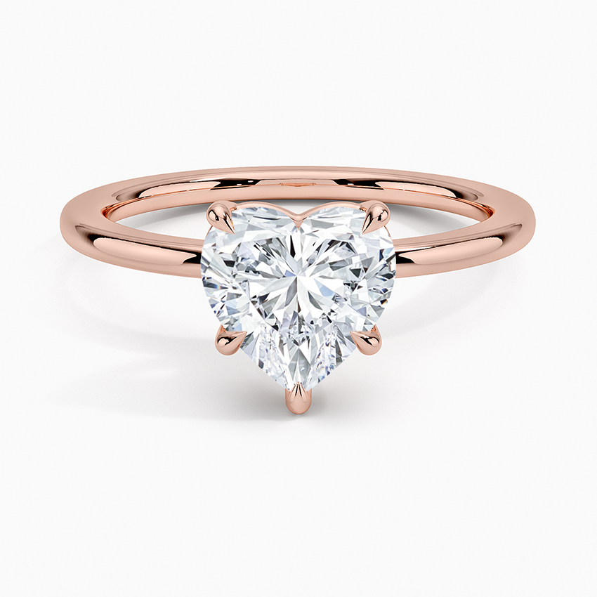 Romantic heart diamond engagement ring in rose gold band