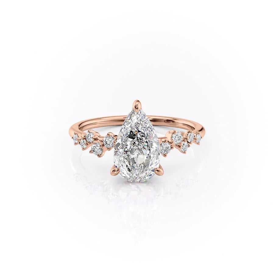Pear Cut Diamond Ring with Round Side Accents 