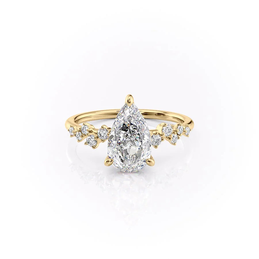 Pear Cut Diamond Ring with Round Side Accents 