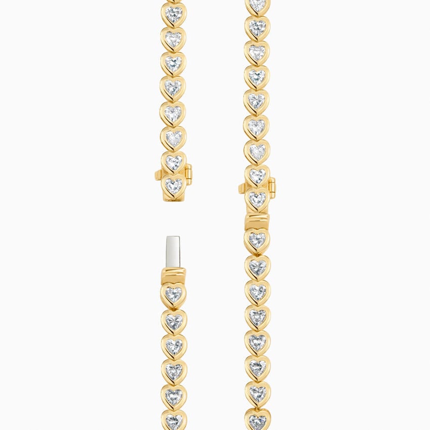 Elegant Heart Gold Tennis Bracelet with Heart-Cut Stones venfora